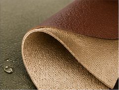 Flexible vegan leather folded to show its backing